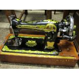 OAK CASED BUTTERFLY SEWING MACHINE