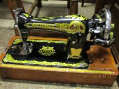 OAK CASED BUTTERFLY SEWING MACHINE