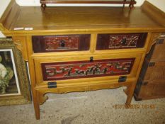 GOOD QUALITY ORIENTAL INFLUENCED SIDEBOARD WITH TWO DRAWERS OVER SINGLE DROP FRONTED DOOR ON SPLAYED