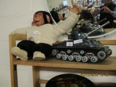 TIN PLATE MODEL OF A TANK TOGETHER WITH A FURTHER MONKEY SOFT TOY (2)