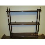 MAHOGANY FRAMED THREE TIER SHELF UNIT WITH TURNED COLUMN SUPPORTS
