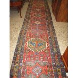 GOOD QUALITY FLOOR RUNNER WITH MULTI-COLOURED GEOMETRIC DESIGNS