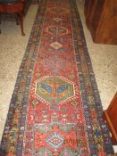 GOOD QUALITY FLOOR RUNNER WITH MULTI-COLOURED GEOMETRIC DESIGNS