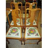 SET OF FOUR BEECHWOOD FRAMED SPLAT BACK DINING CHAIRS WITH EMBROIDERED SEATS AND PAD FRONT FEET