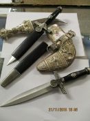 SILVER PLATED CASED KUKRI AND TWO MODERN GERMAN DIRKS (3)