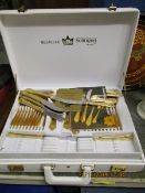 CREAM LEATHER BRIEFCASE CONTAINING MIXED BISTECKE SPS GOLD PLATED CUTLERY