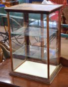 Late 19th/early 20th century display cabinet, glazed back and front and sides and fitted interior