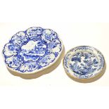 English Delft plate with a floral design within manganese border together with a large Dutch Delft