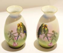 Pair of Continental porcelain vases modelled with budgerigars on branches, 15cm high (2)