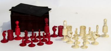 Group of ivory chess pieces in wooden box