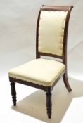Victorian mahogany child's chair in the form of a nursing chair, calico upholstered back and seat