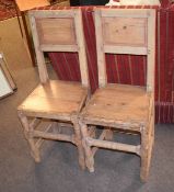 Pair of stripped/scrubbed pine solid seat chairs