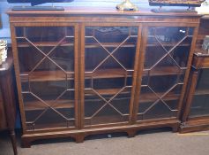 Good quality reproduction mahogany bookcase, the front with three astragal glazed doors enclosing