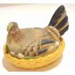 Continental porcelain hen tureen and cover, the basket base and cover modelled as a hen seated on