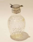 Cut glass decanter with silver collar and spout, the silver hallmarked for Chester, together with