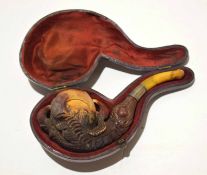 Meerschaum type carved pipe with white metal collar and bone stem in leather case