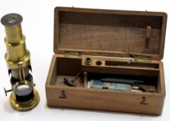 Microscope in original wooden case, 17cm high