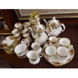 Royal Albert tea and coffee set comprising nine cups, saucers, two large coffee cans, tea pot,