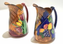 Pair of Tuliptime ewers, decorated with tulips on a brown ground by H & K Tunstall Ltd, 21cm high (