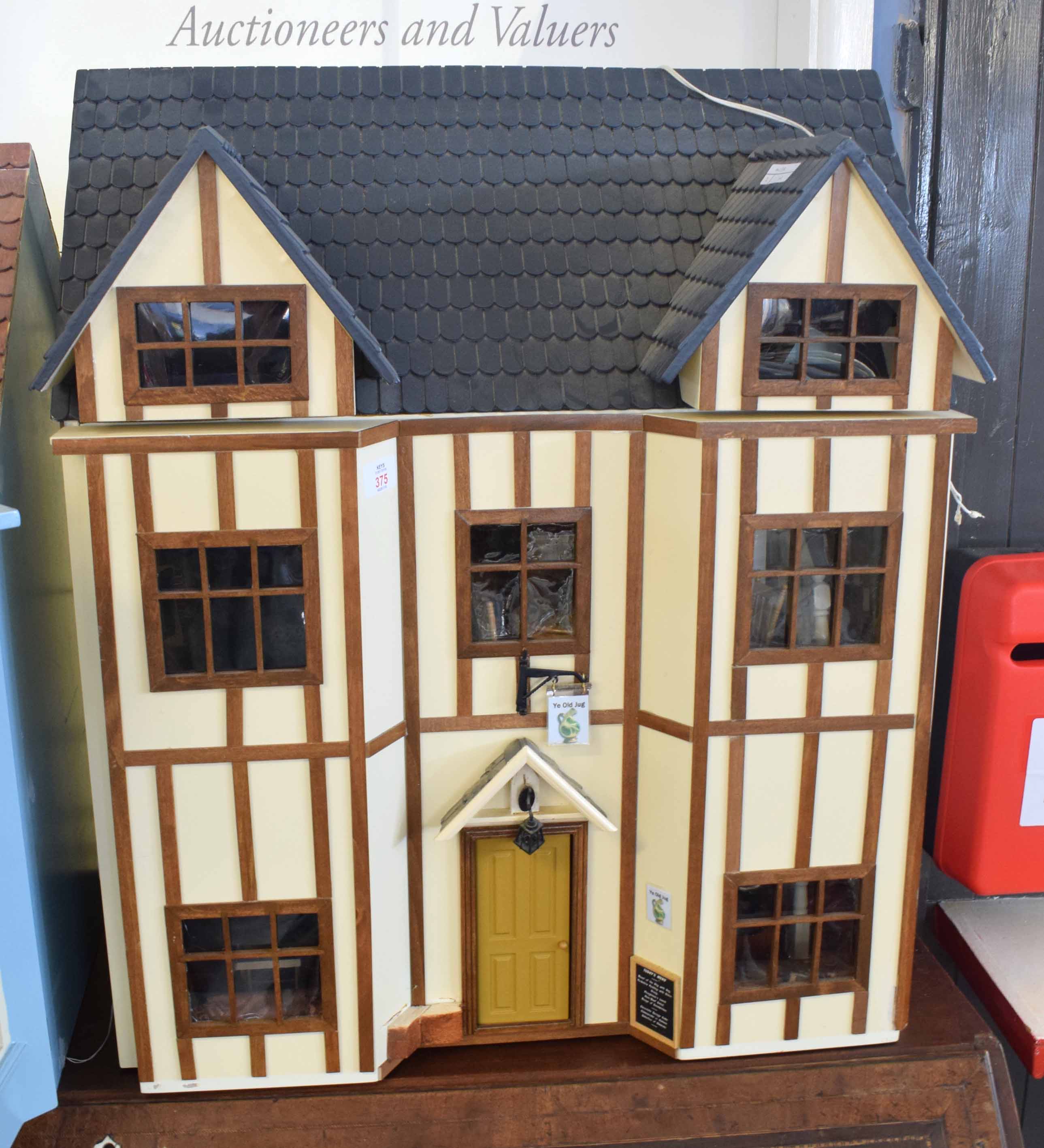 Modern kit dolls house "Ye Old Jug", opening front enclosing four rooms with two staircases,