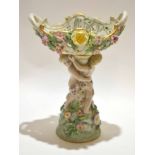 Late 19th century porcelain tazza decorated in Meissen style with two cherubs supporting a