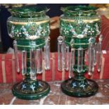 Pair of green glass lustres, decorated with garlands of flowers hand painted in gilt, pale blue