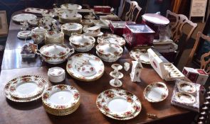 Extensive Royal Albert dinner service and accessories including a large fruit bowl, four calendar