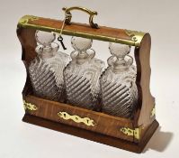 Late 19th century mahogany and brass mounted three bottle tantalus, 32cm wide