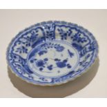 Chinese Kangxi porcelain small dish decorated in typical fashion with floral sprays within a cell