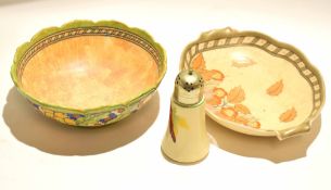 Group of Charlotte Rhead wares and a Clarice Cliff sugar shaker with an autumn leaf design, the