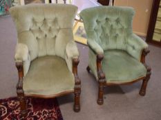 Set of two graduated Victorian oak framed green upholstered armchairs