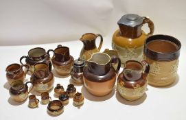 Quantity of Doulton Lambeth jugs and other items including some miniature wares (qty)