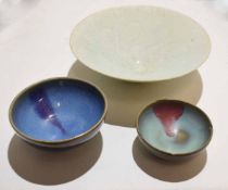 Chinese celadon porcelain flared bowl together with two Chinese pottery bowls with Tenmoku type