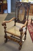 Victorian mahogany large carver chair, cresting rail carved with figures with central jardiniere