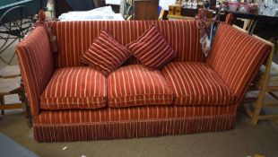 Knole style sofa, upholstered in red stripe with fringe below, 220cm wide