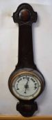 Early 20th century oak wheel barometer (vernier missing), circular face 80cm long