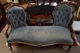 Victorian rosewood double hoop back sofa, splayed back joined in the centre by a scrolled rail
