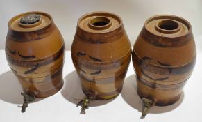 Three 19th century stoneware spirit barrels, 28cm high (3)