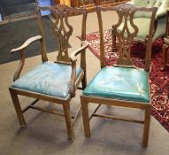 Set of eight Chippendale style mahogany dining chairs, comprising two carvers and six single chairs,