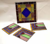 Group of four stained glass panels