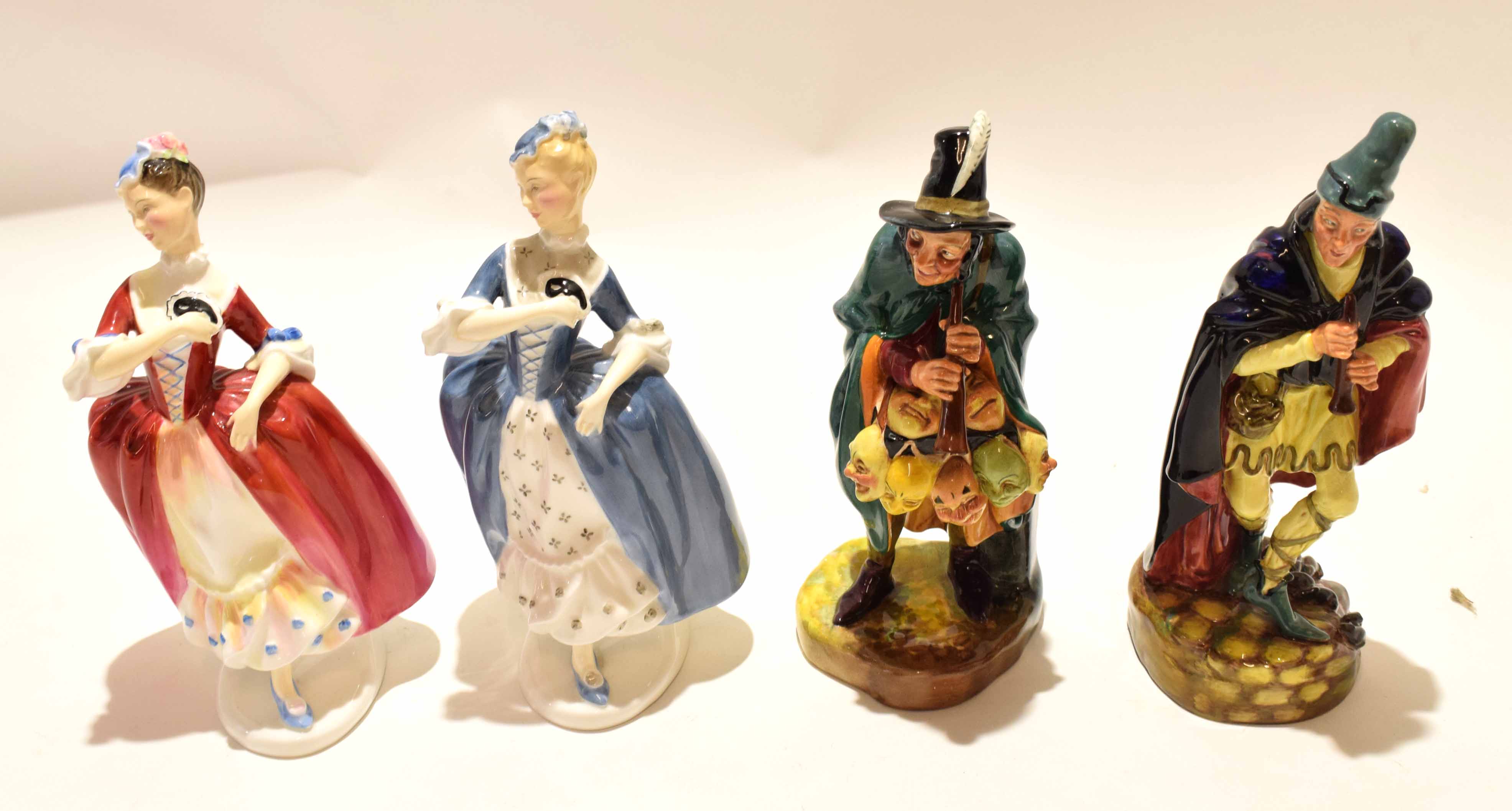 Group of four Royal Doulton figures including Masquerade (x2), The Mask Seller, and Pied Piper (4)