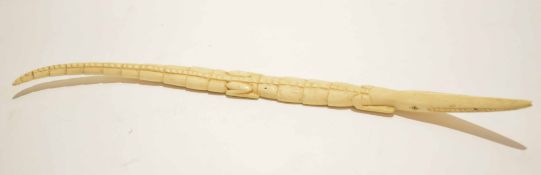African ivory carving of a crocodile, early 20th century, 45cm long