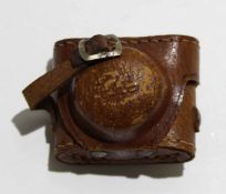 Mid-20th century miniature Japanese HIT camera in original leather case