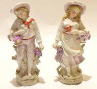 Early 20th century Continental porcelain figures of a girl and a boy (2)