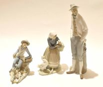 Group of Lladro figures, one of The Goose Girl, further model of a young boy and a large figure of