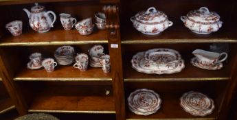 Quantity of Coalport porcelain Indian Tree coral design including dinner wares, two tureens, serving