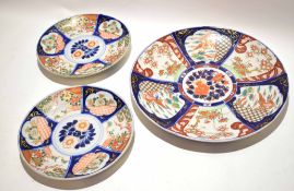 Group of three Japanese porcelain dishes, all decorated in Imari style in typical fashion, the