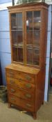 19th century mahogany bookcase cabinet of narrow proportions, glazed top enclosing fitted adjustable
