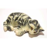 Model of a sleeping cat signed Winstanley, 18cm long