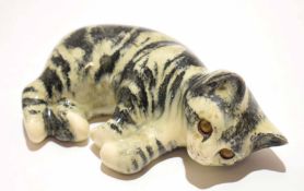 Model of a sleeping cat signed Winstanley, 18cm long